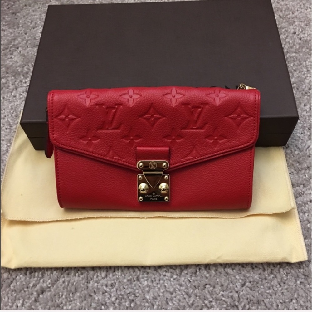 Brand new Louis Vuitton with tags authentic clutch